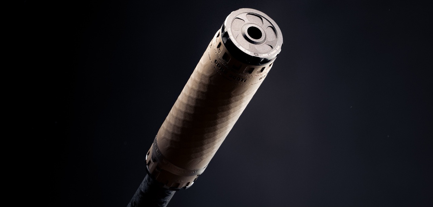 TiTrex® 300 Cal Titanium FDE Suppressor Studio Shot 2 Precision Armament TiTrex® 300Cal Titanium FDE Suppressor on a dark background with high contrast lighting